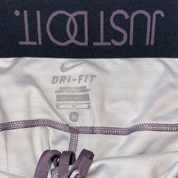 Nike Black and Purple Leggings with Reflective Accents - Picture 2 of 9